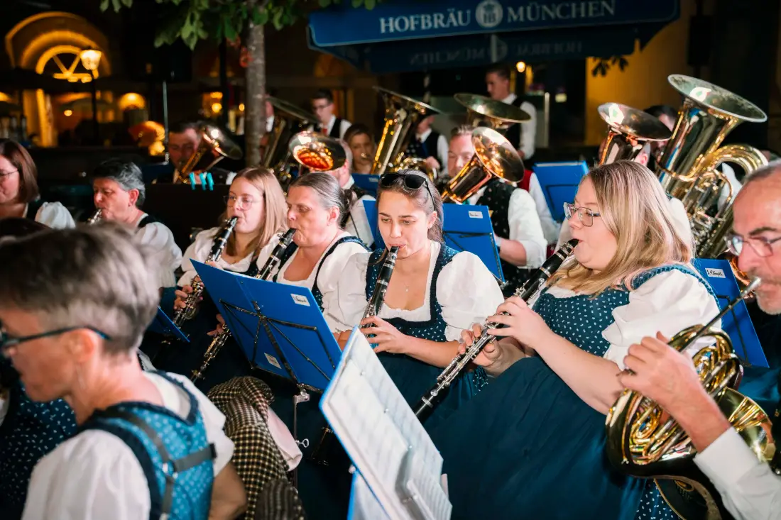 Brass band in traditional dress playing at an Oktoberfest